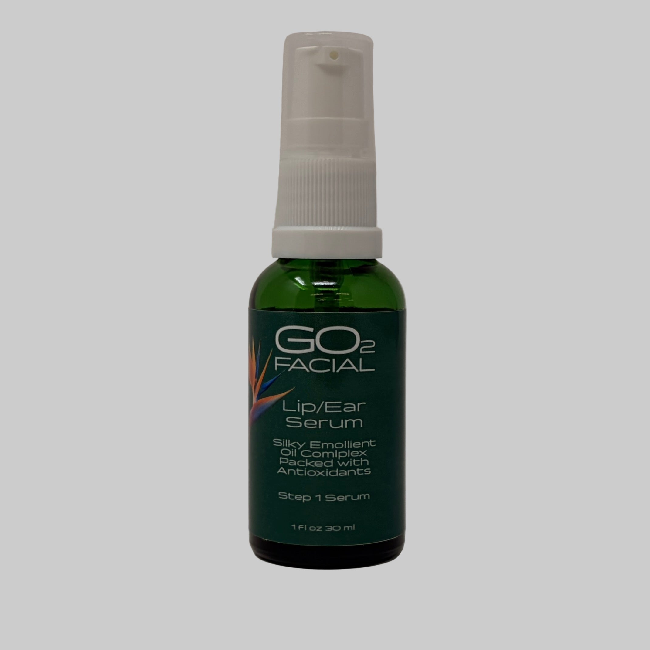 GO2 Facial Lip/Ear Serum in a green bottle on a white background