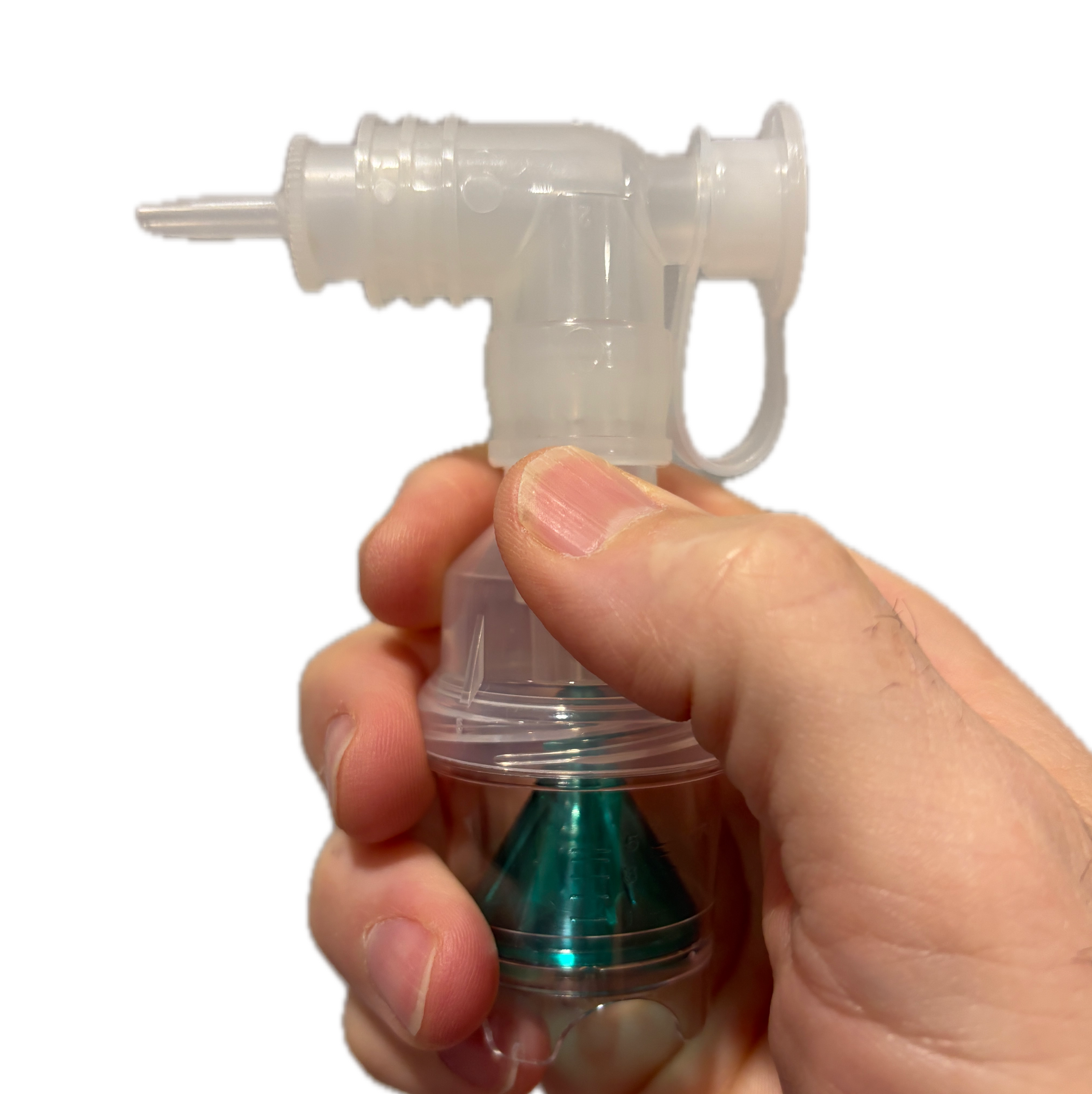 Hand holding complete hand piece with green cone center.